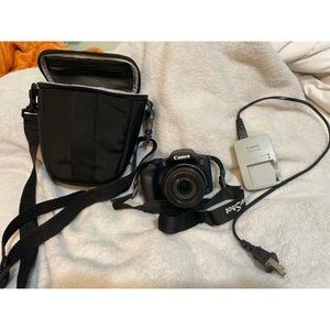 Canon Camera with Bag, charger and battery